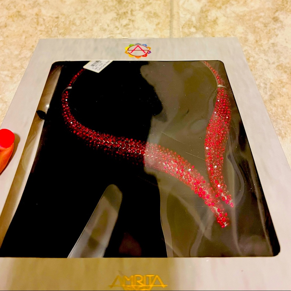 Red choker open ends . Very chic looking .